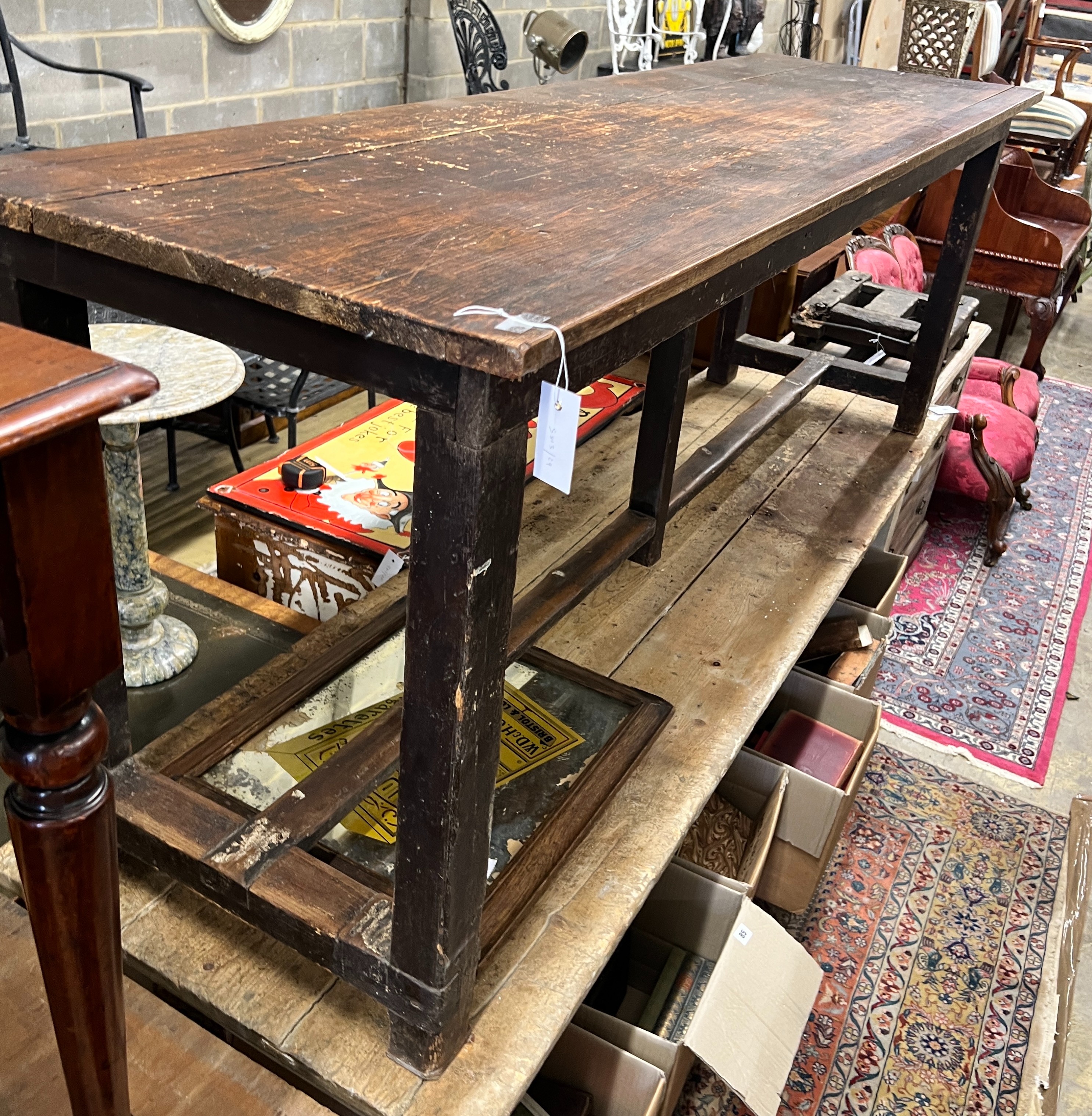 A Victorian stained pine rectangular kitchen table, length 208cm, depth 60cm, height 75cm